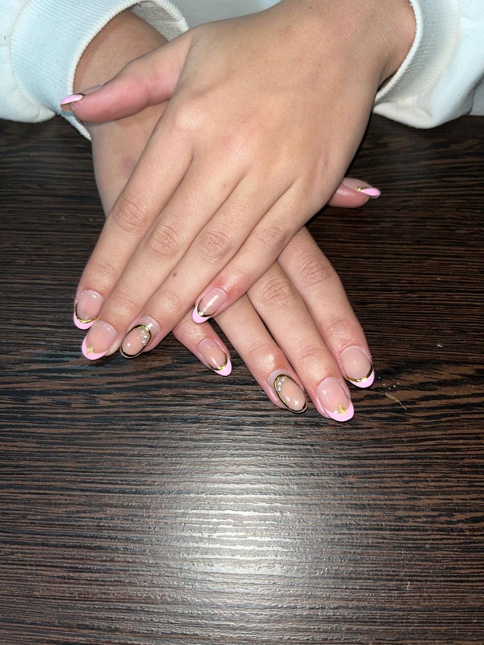 Soft pink French tips by Bronwyn