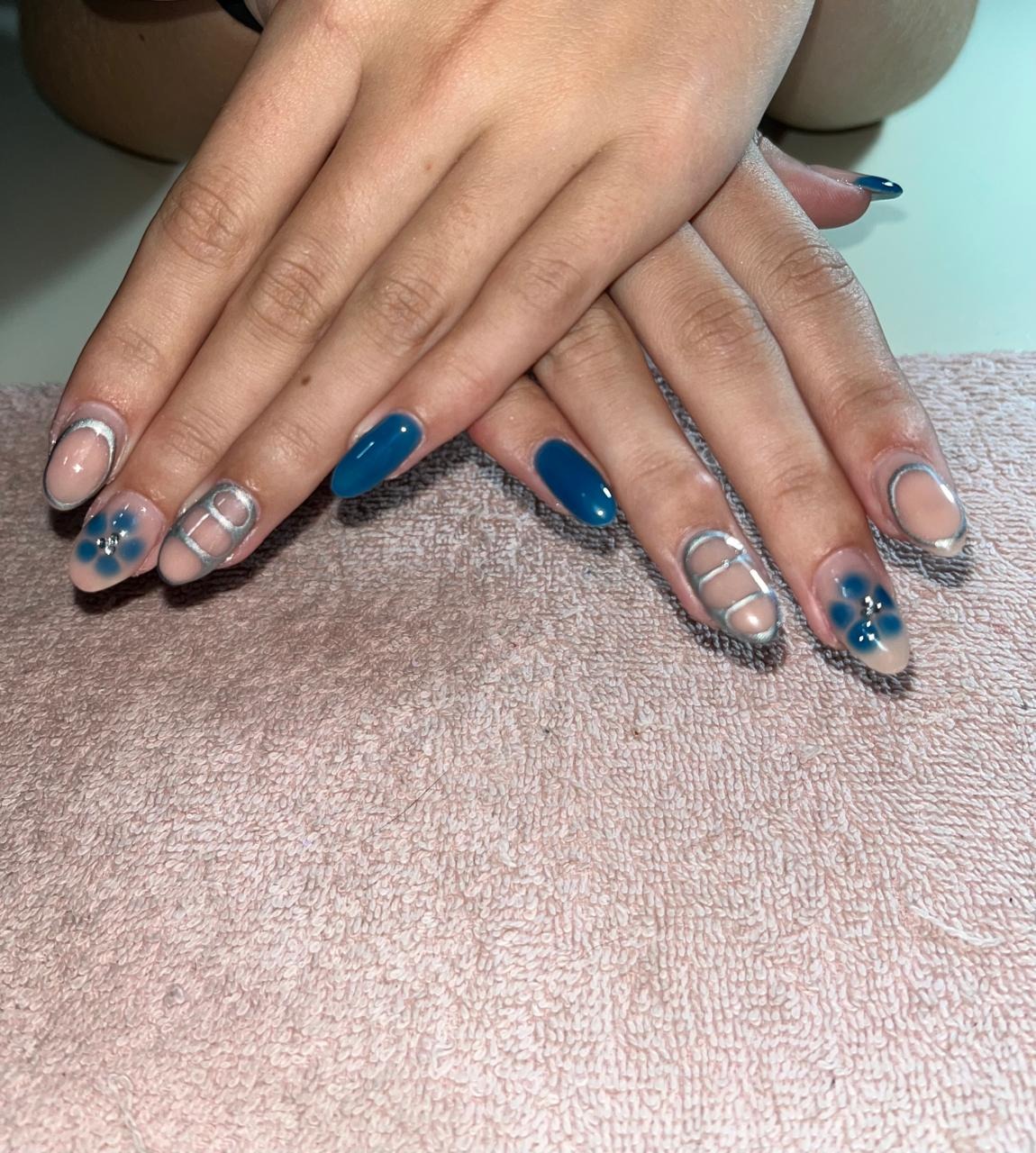 Blue florals & silver nail design by Nails by B